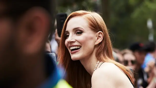 Jessica Chastain smiling at fans